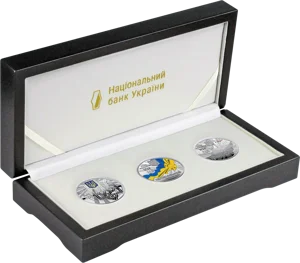 Набір із трьох срібних пам`ятних монет `Державні символи України`у футлярі